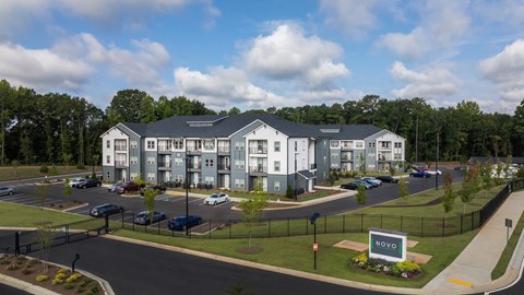 A large building with the word NOVA on the front lawn.
