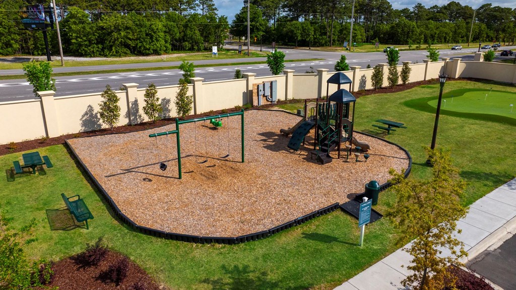 an aerial view of a playground in a park