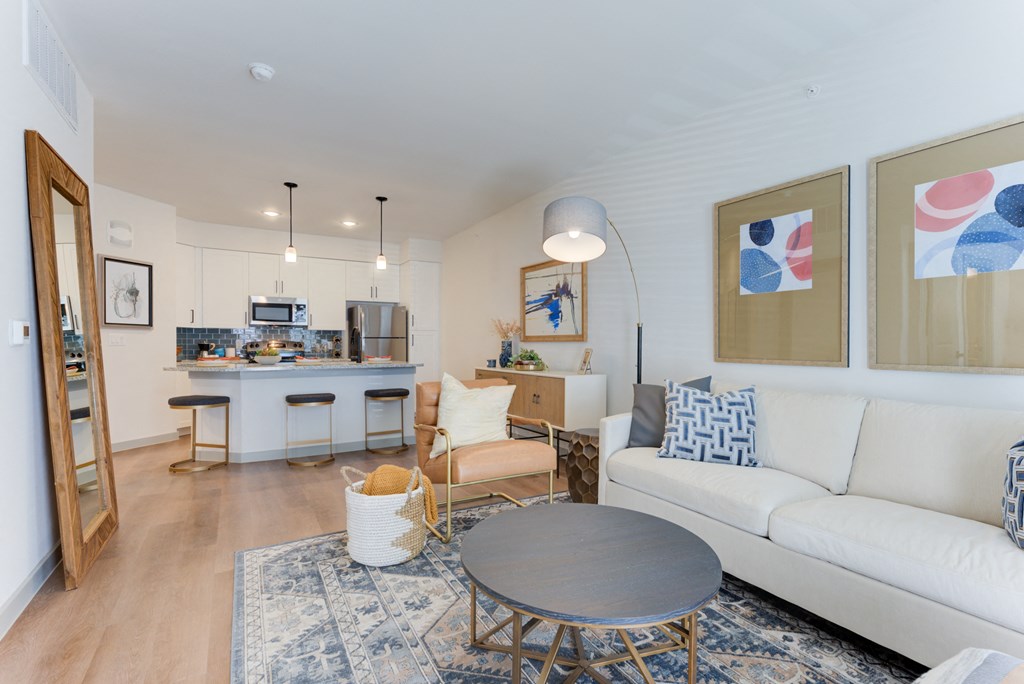 a living room with a couch and a table