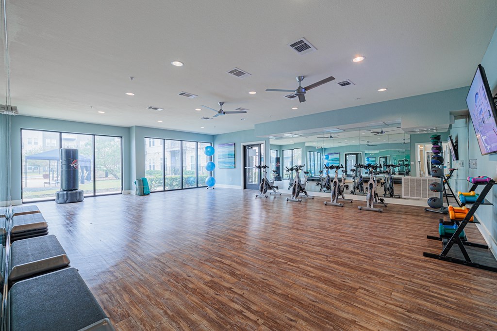 the gym atrium at the district at highland village apartments