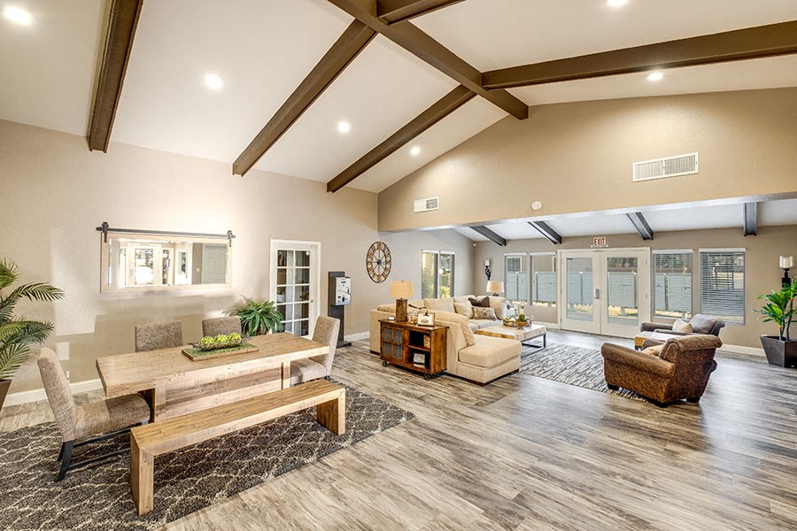 a living room with furniture and a table