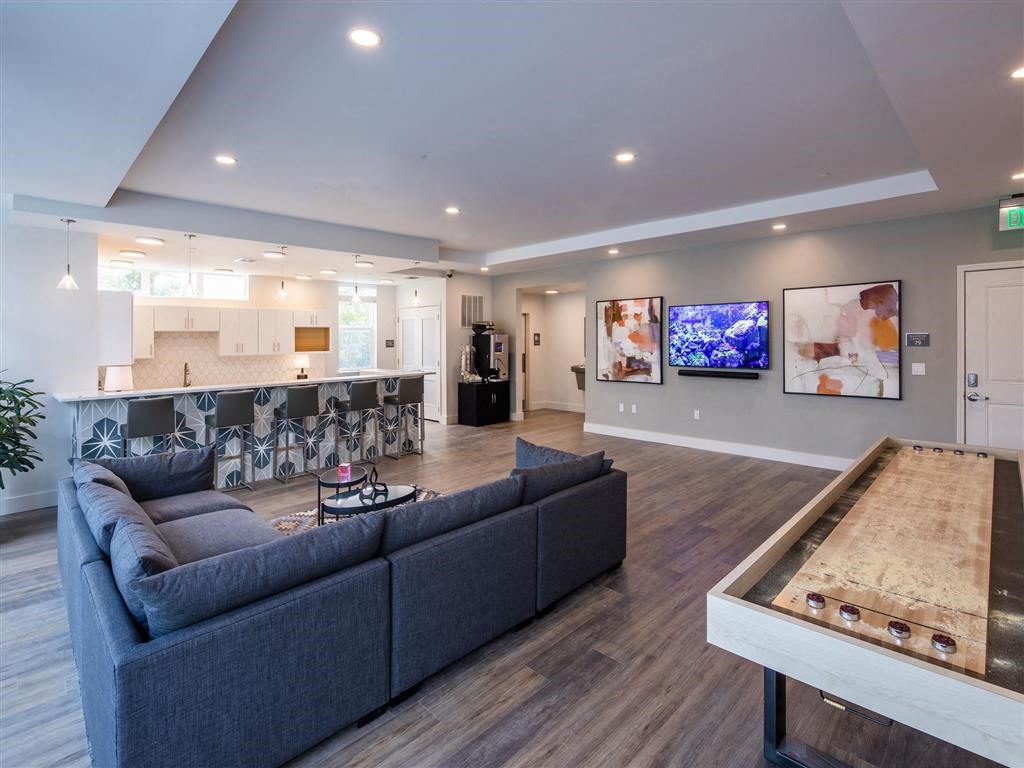 a living room with a couch and a table