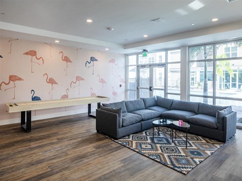 a living room with a couch and a table