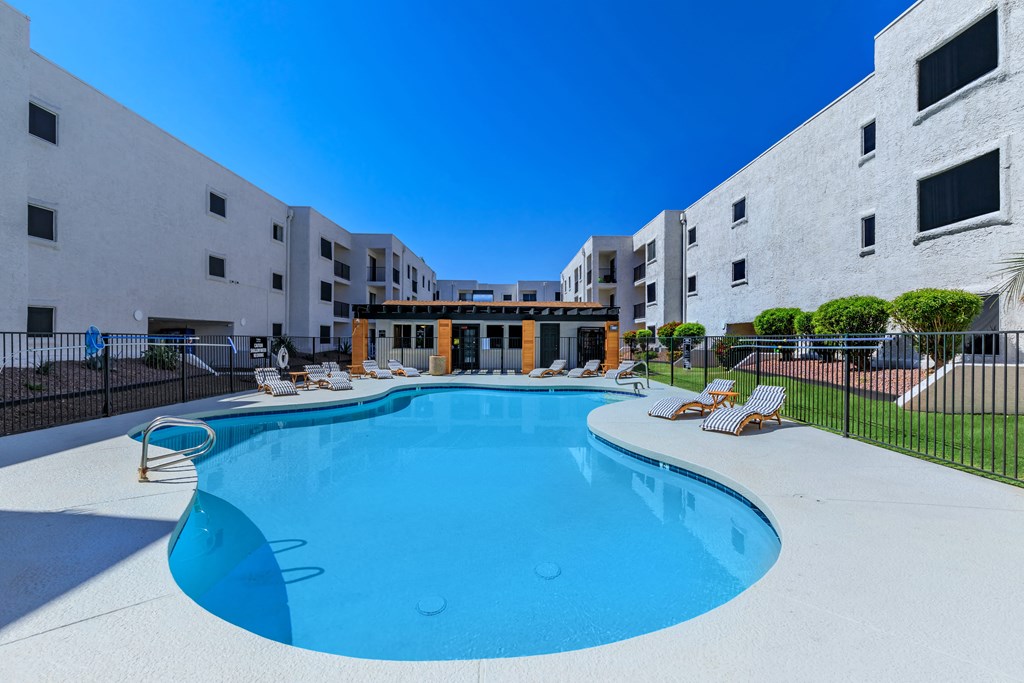 our apartments have a large resort style pool with lounge chairs