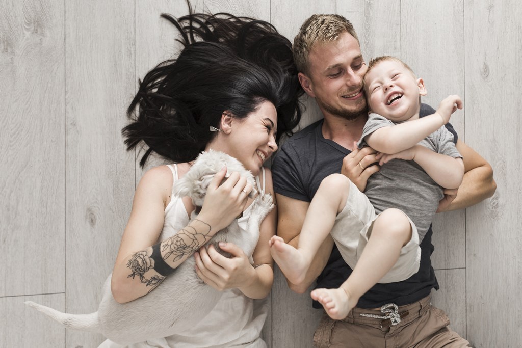 a family of three with a baby