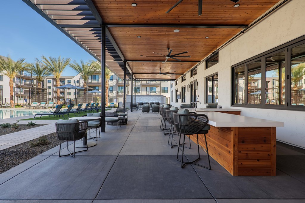 A patio with a table and chairs is shown.