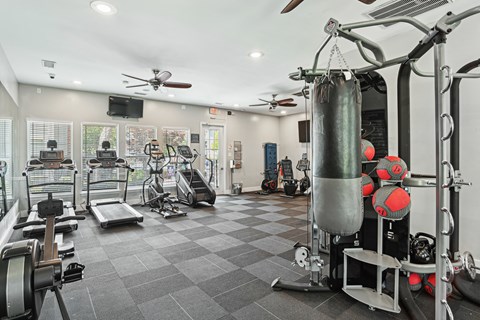 A well-equipped gym with a variety of exercise machines and equipment.at Greys Harbor at Lake Norman, Huntersville, 28078
