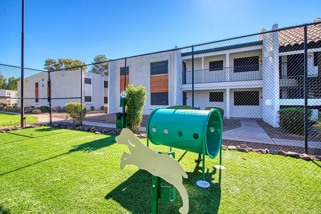 a dog park in front of a building