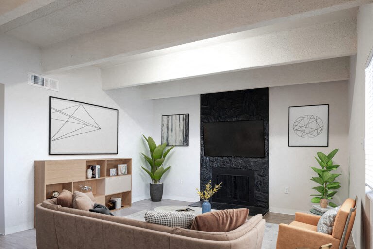 a living room with a couch and a fireplace