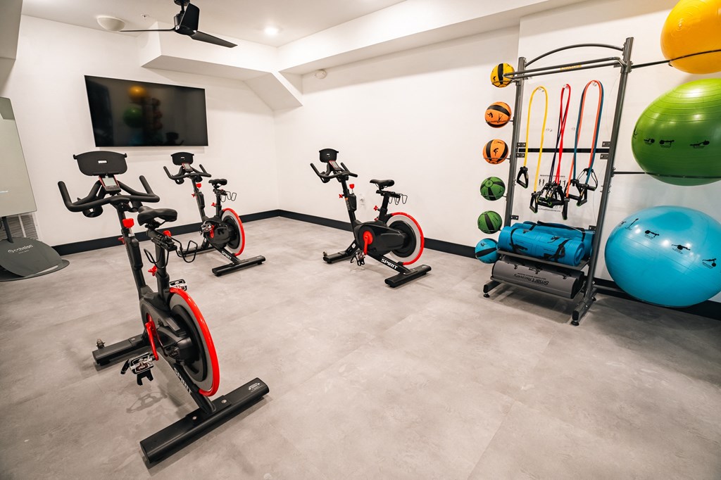 cardio room with spin equipment