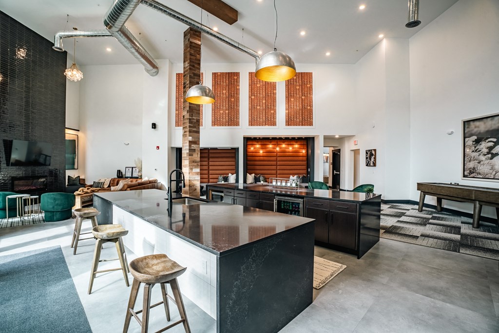 clubhouse with vaulted ceilings and two bar areas