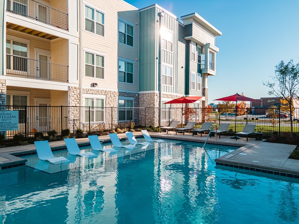 luxurious swimming pool with ample seating