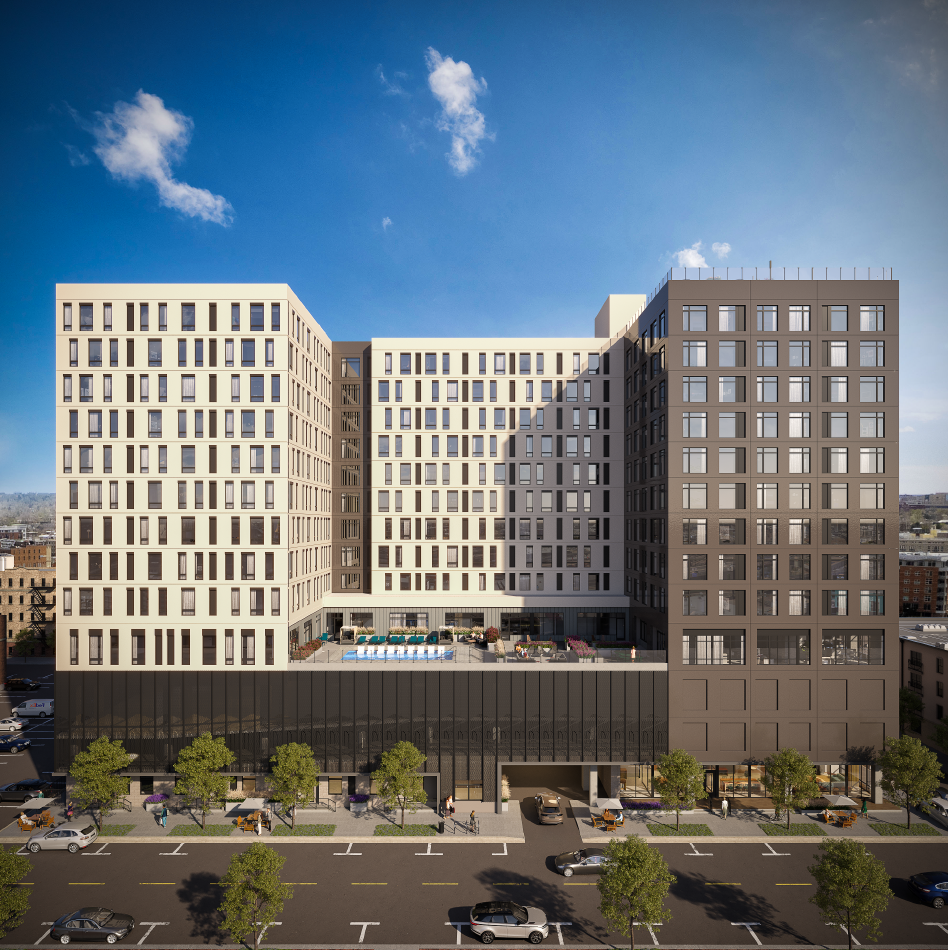 an aerial view of a building and a parking lot