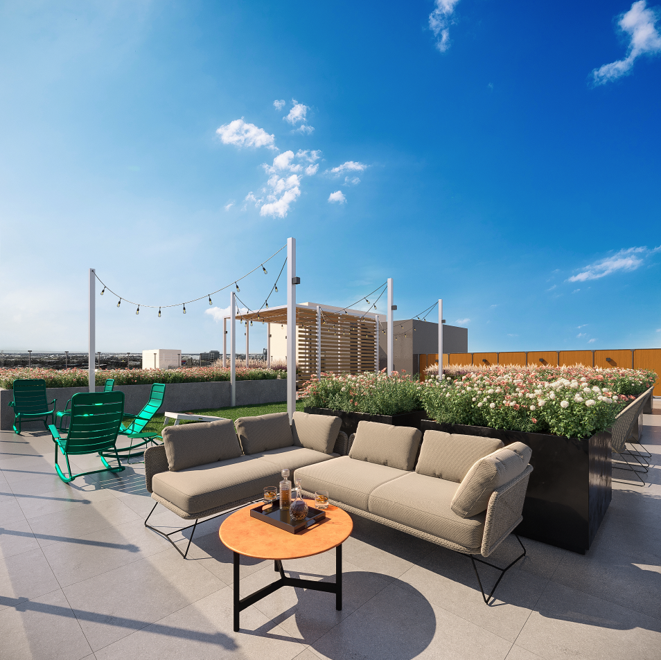 a terrace with couches and chairs and a table