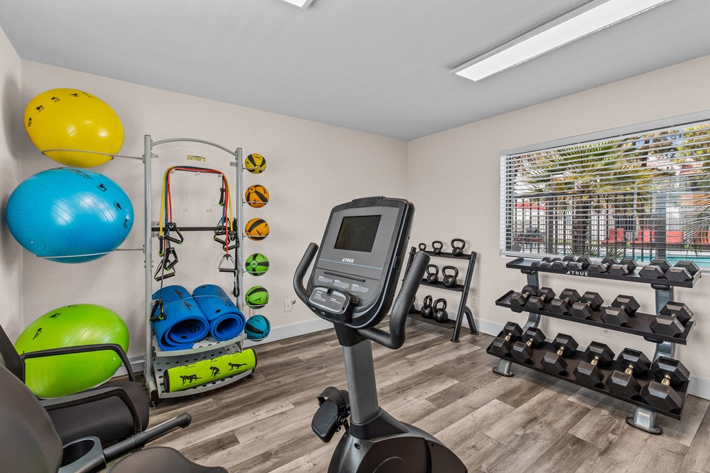 the preserve at ballantyne commons fitness room with exercise equipment and weights