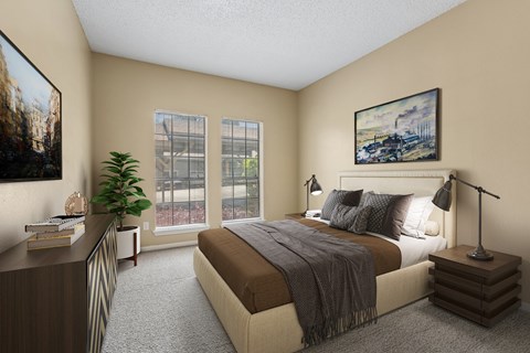 A bedroom with a large bed, a nightstand with a lamp, and a painting on the wall.