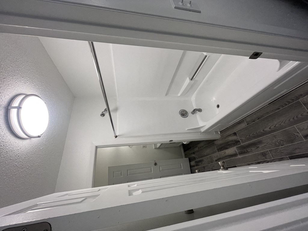 the mirror in the bathroom is above the sink