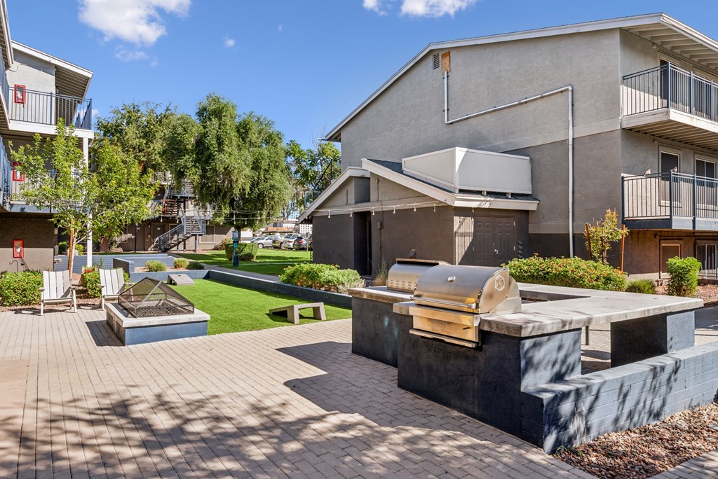 A modern house with a patio and a hot tub.