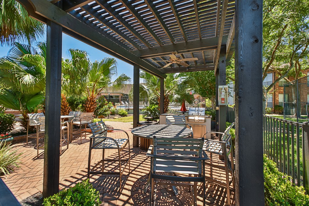 patio outdoor with a grill