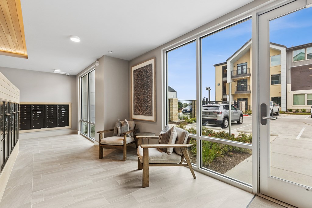 A modern living room with a view of the street outside.