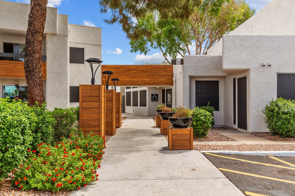a house with a long walkway in front of it