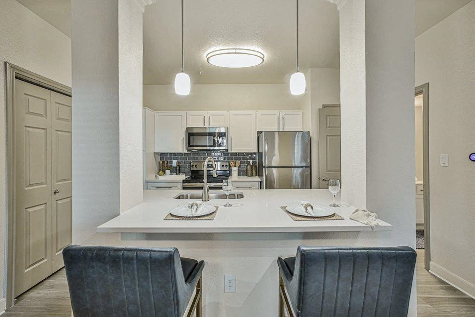 kitchen with beautiful blue barstools