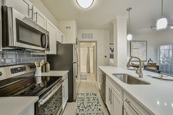 kitchen with white countertops - Photo Gallery 6