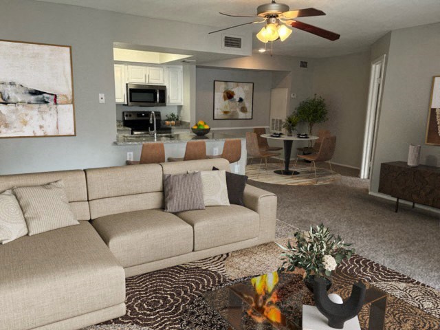 a living room with a couch and a table