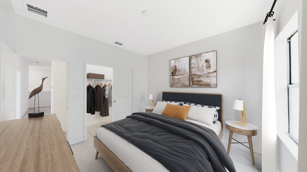 a bedroom with a bed and a closet