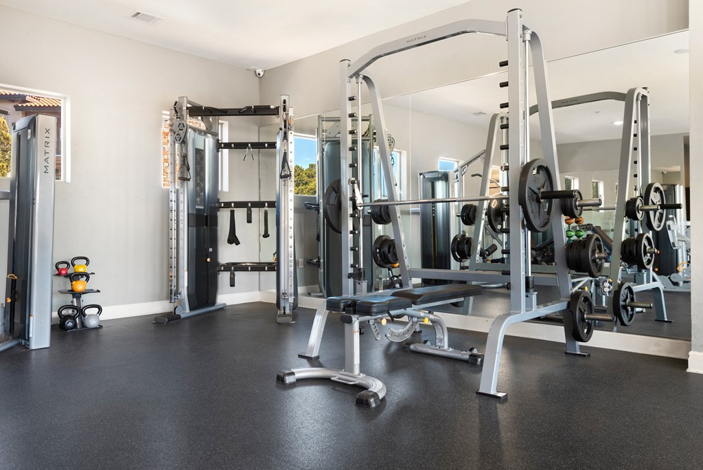 a gym with a lot of equipment