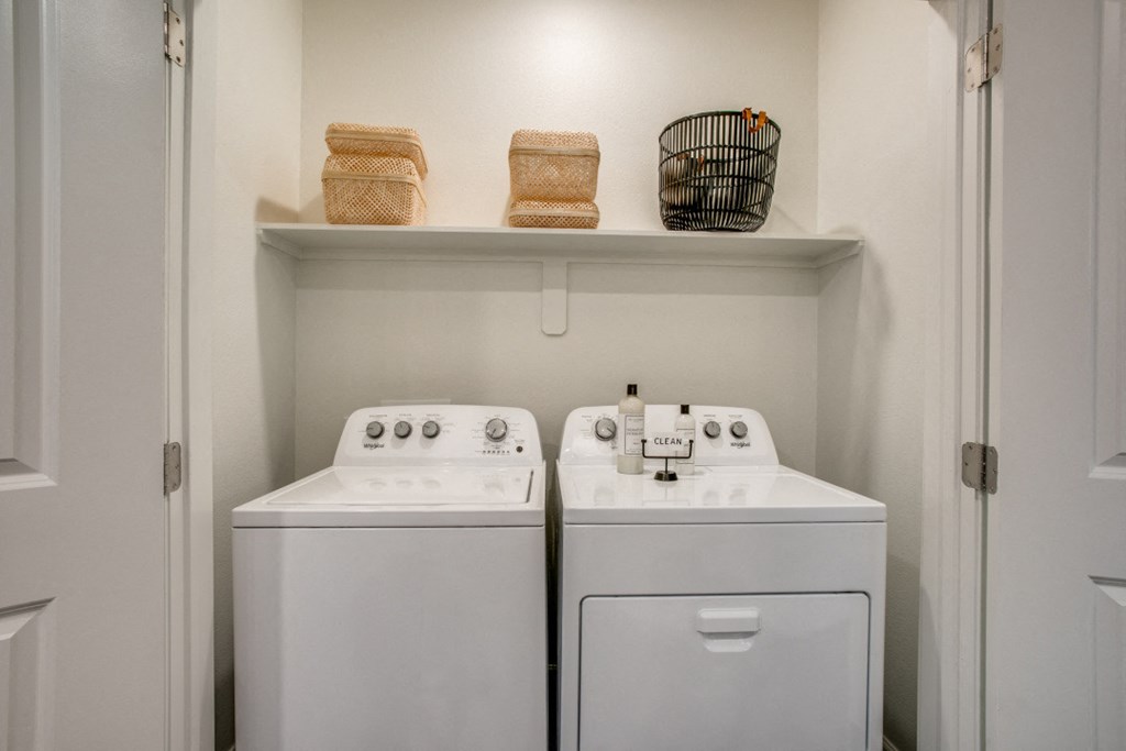 a washer and dryer in the laundry room