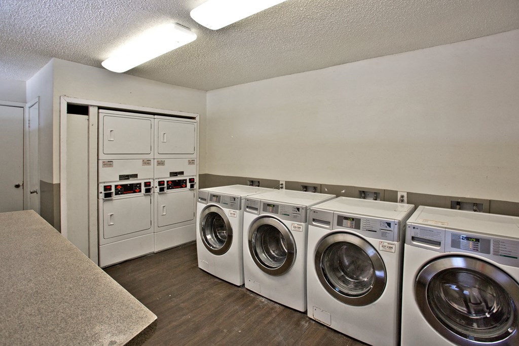 the preserve at ballantyne commons laundry room with washes and dryers