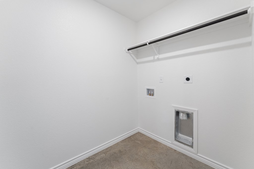 a white room with a white wall and a window and a door