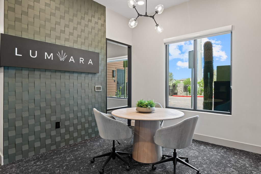 A conference room with a Lumvara sign on the wall.