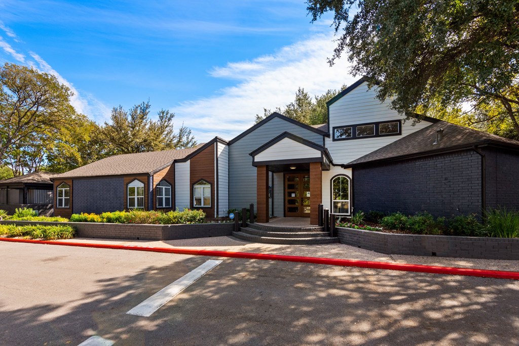 a house with a driveway in front of it