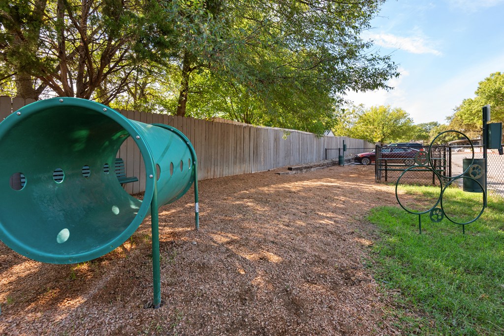 the playground at the whispering winds apartments in pearland, tx