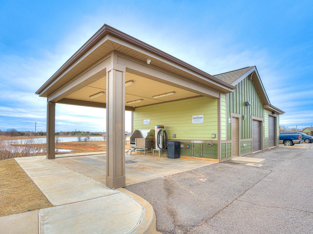 a gas station with a blue sky in the background