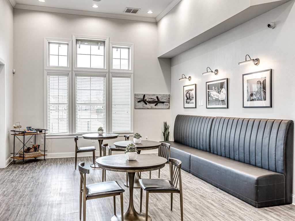the reserve at bucklin hill leasing office common area with couch and tables