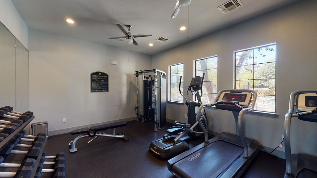 gym with exercise equipment at the district at highland village apartments