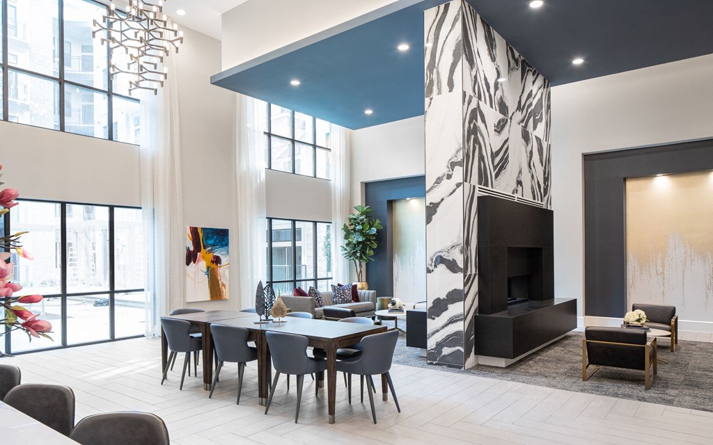 a dining room with a table and chairs and a fireplace