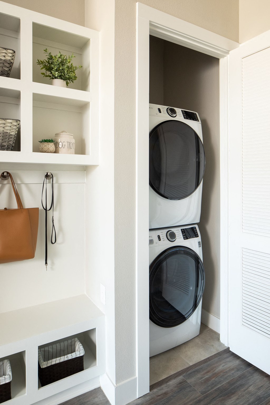 a small laundry room with a washing machine and a dryer