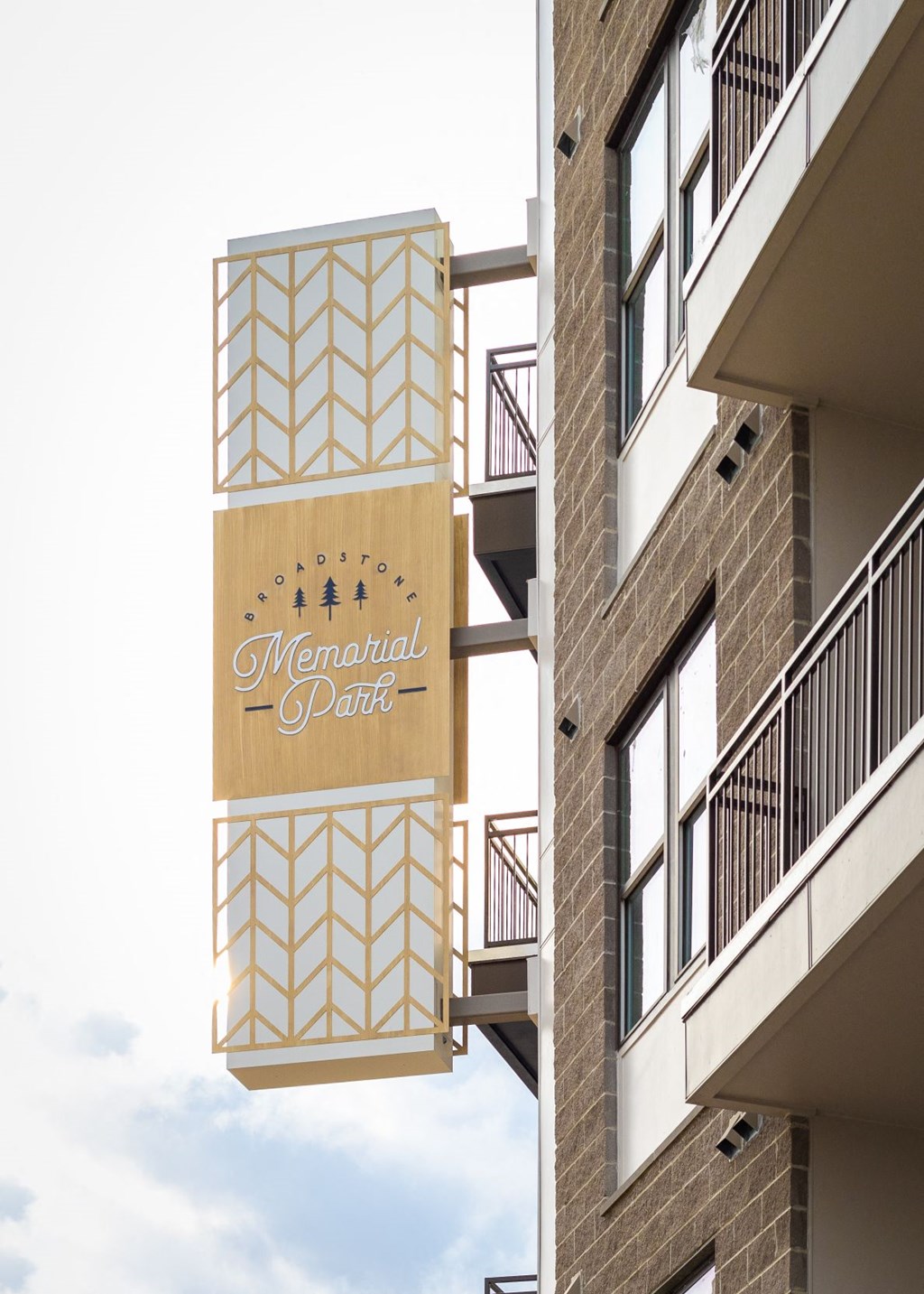 a sign for the merchant space on the side of a building