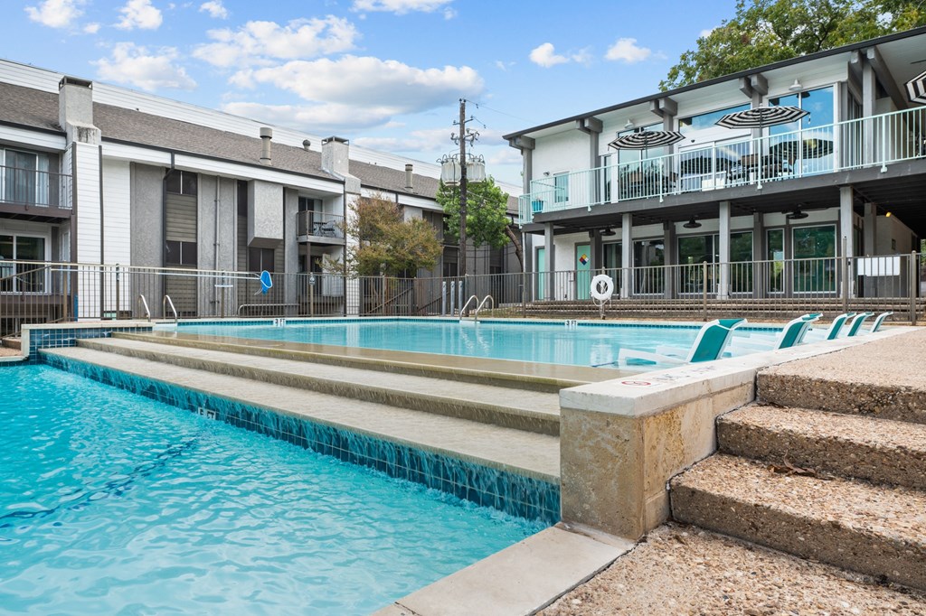 the swimming pool at the falls at borough park apartments