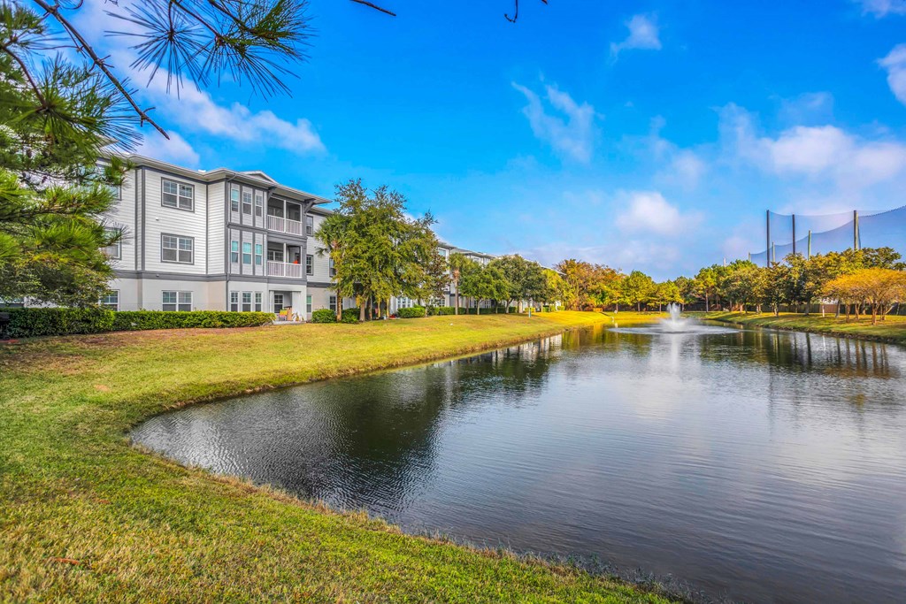 the preserve at ballantyne commons waterways with apartment buildings on the other side of