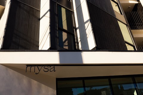 A building with the word "mysa" written on it.