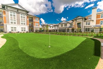 a putting green at regalia bella terra in katy