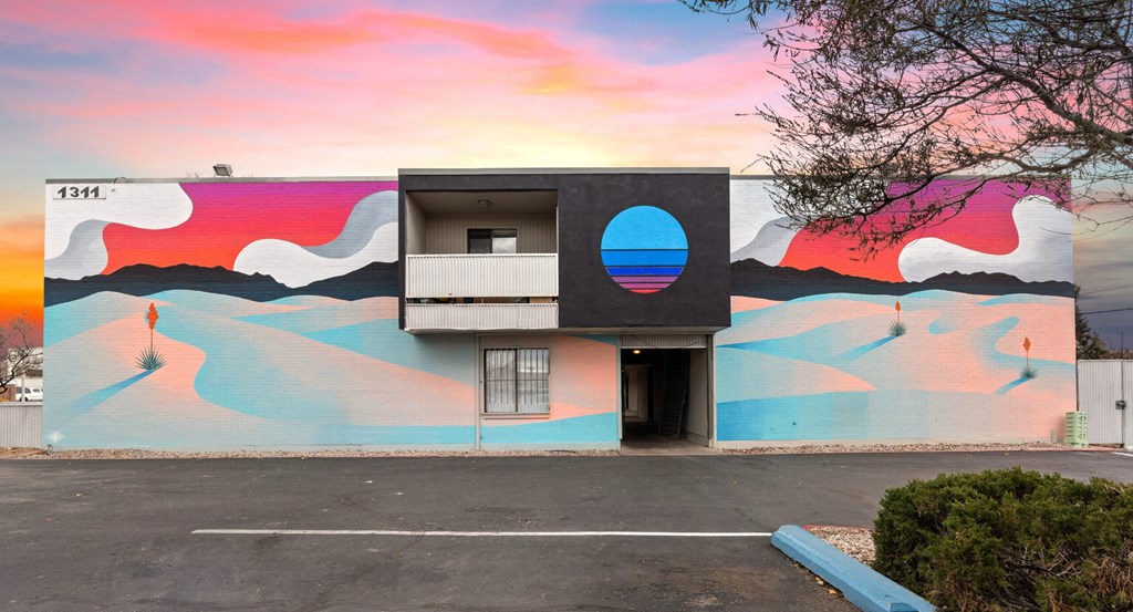 a building with a colorful mural on the side of it