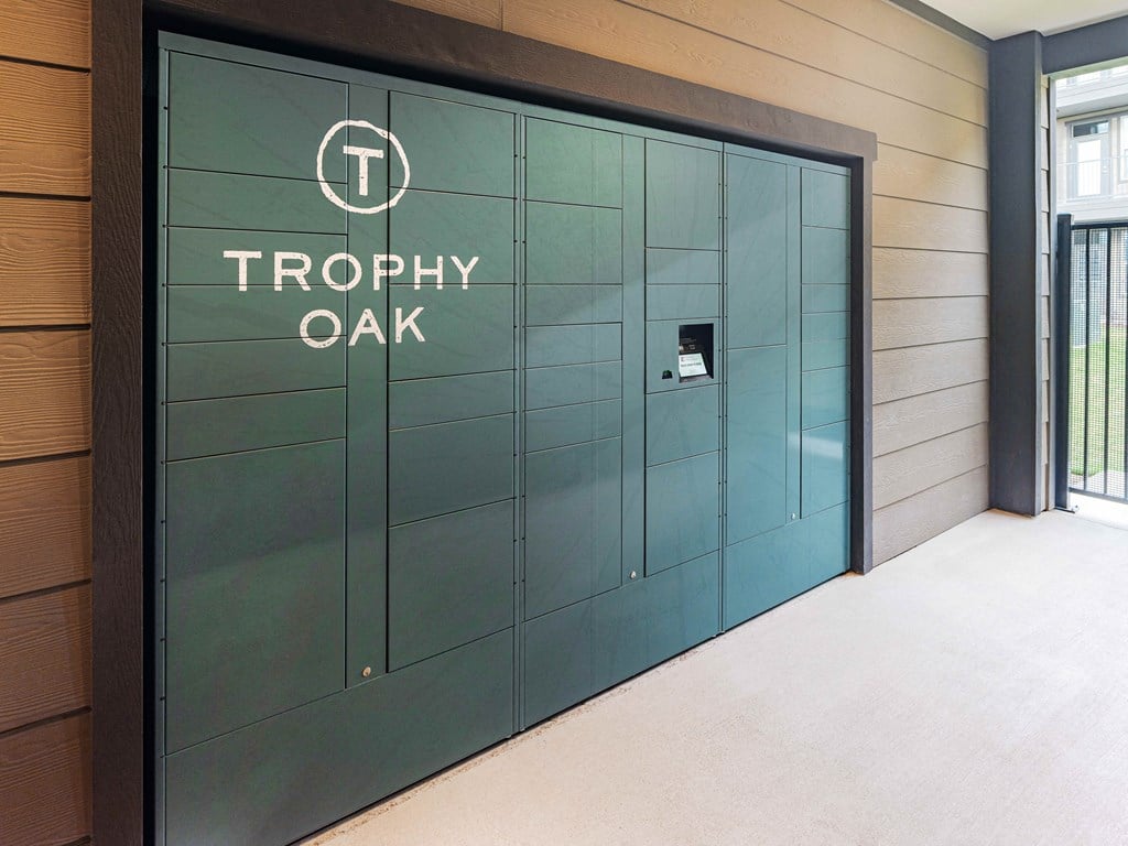 green mail kiosk with trophy oak branding