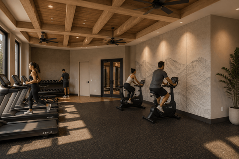 A group of people are exercising on treadmills in a gym with a wall drawing.
