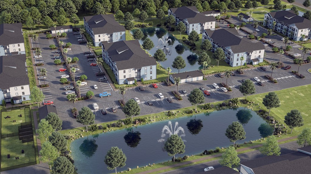 an aerial view of a neighborhood with a lake and houses